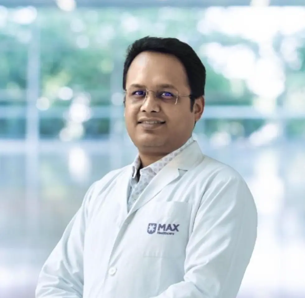 Dr Ashish Anand, laparoscopic and laser proctology surgeon in Lucknow, in a Max Healthcare coat